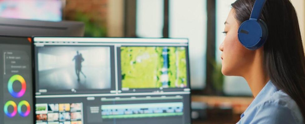 A woman doing video editing